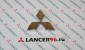 Эмблема задняя  серебристая - Lancer96.ru